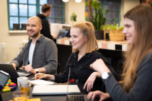 candid shot of startup team aidable